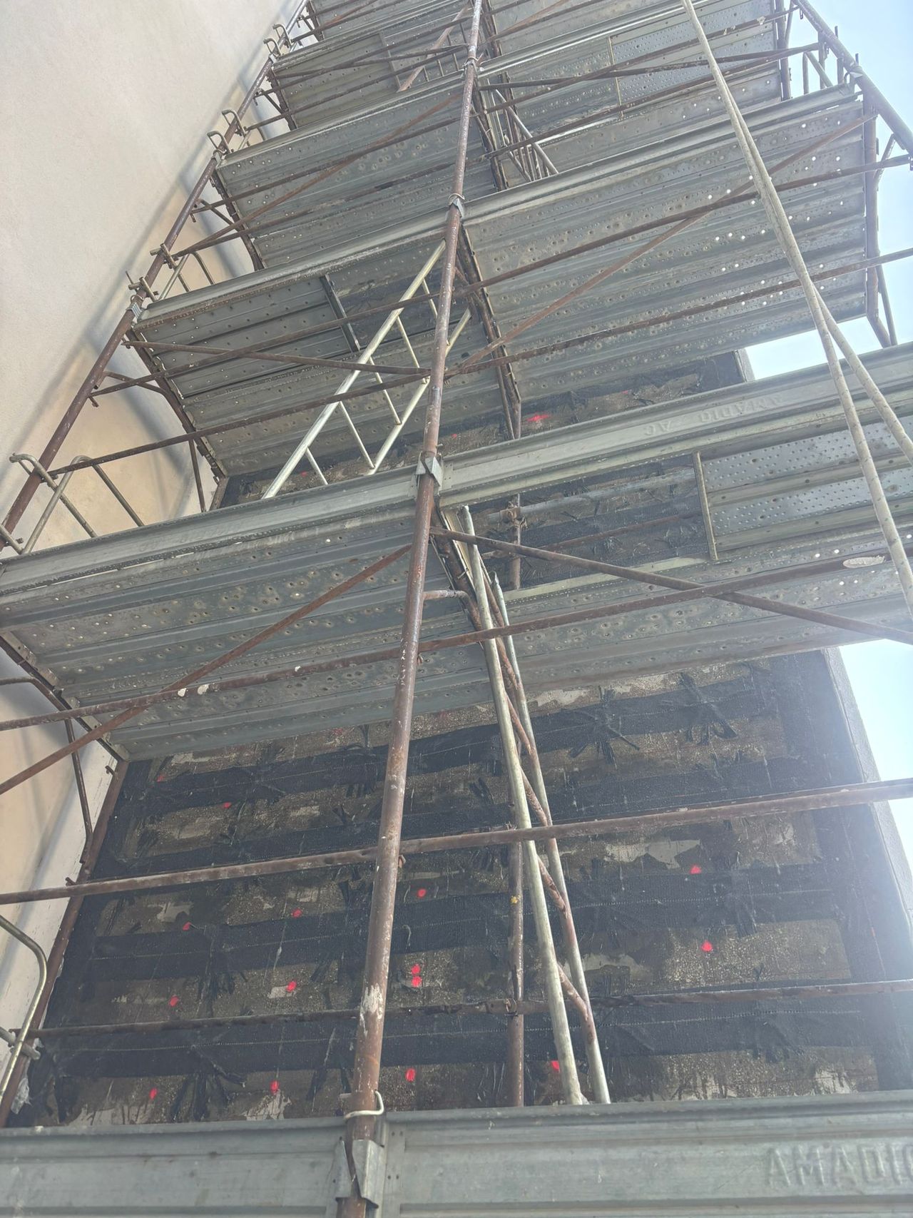 Carbon fibre structural strengthening carried out from the scaffolding